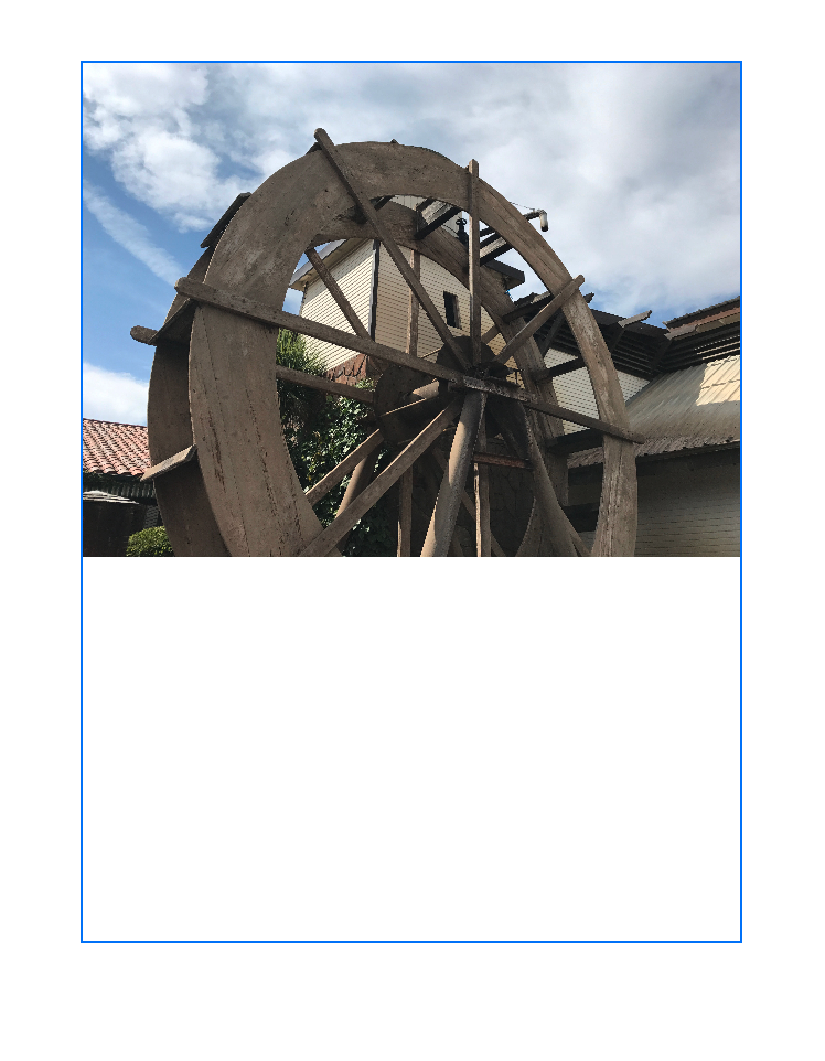 一张图像，显示一个带蓝色边框的框叠加在水车图像之上。水车图像被缩放以适配所在矩形的宽度。从图像底部到矩形底部留有一段空白。